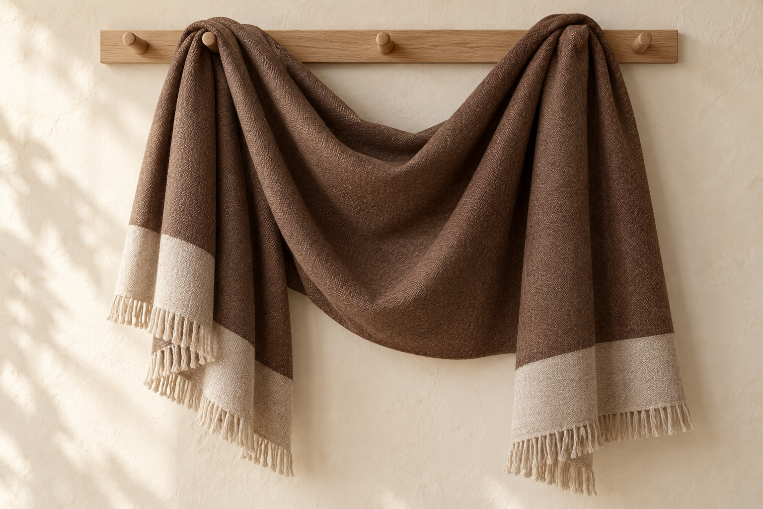 AI-generated concept visualization of The Long Exhale Shawl: generous wrap · cocoa & oatmeal
